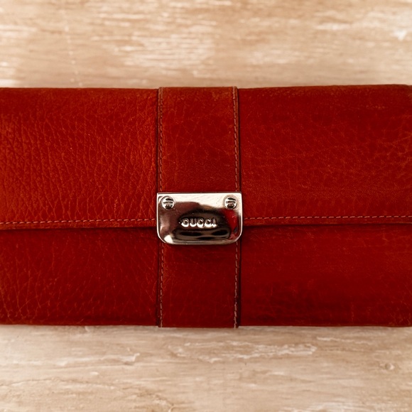 Gucci Handbags - Gucci Cognac Leather Clutch with Silver Accent